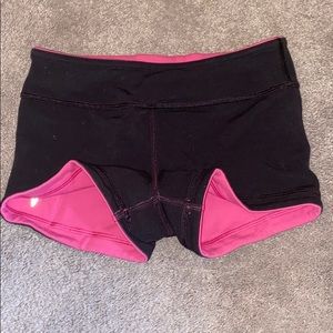 Ivivva Booty Shorts in reversal pink to black